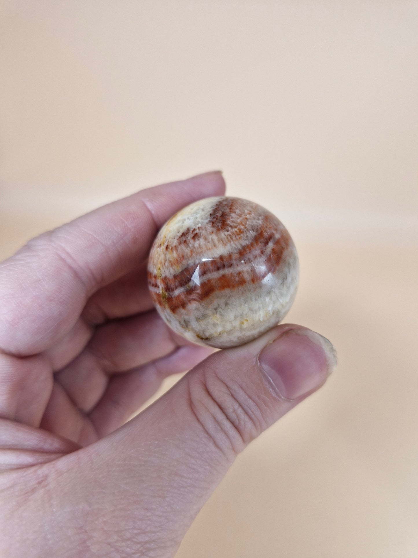 Red Banded Calcite Sphere (code C)